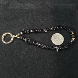 Black Beaded Device Wrist Strap with Gold Accents